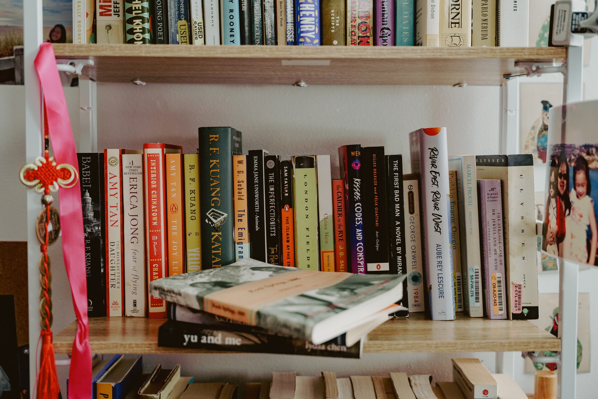Shelf of books used as research and visual references for Book Talk.