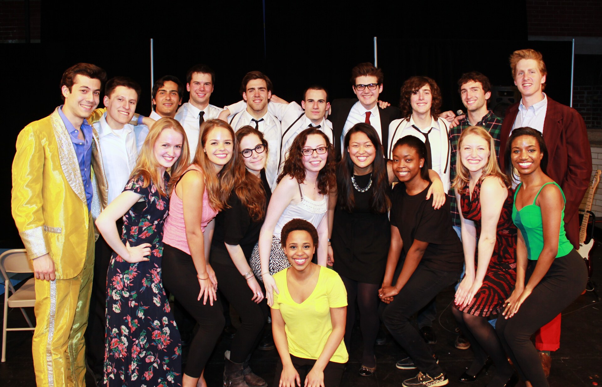Large That Thing You Do cast and crew group portrait on stage.